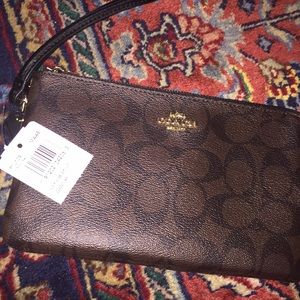 Never been used Coach wristlet